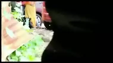 Girl caught making out with lover outdoor by car in Desi mms video