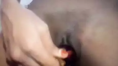 Indian guy films porn video of girlfriend masturbating in the bathroom
