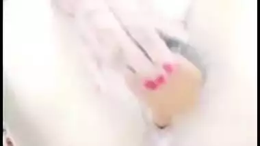 Ever-horny Pakistani wife inserts hair brush into her Desi XXX anus
