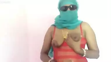 Indian mom sucking a dildo and sticking it in her XXX pussy