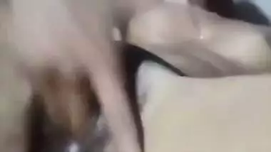 Nude Bangla girl sticks fingers into her juicy XXX cunt in Desi porn