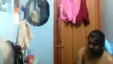 Indian whore closes the door and starts daily XXX striptease home