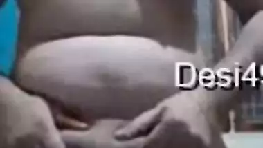 Naked Desi gal in medical mask entertains guys with hairy XXX twat