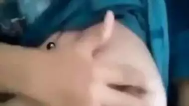 Naughty Desi minx lifts up shirt and shows her natural XXX breasts