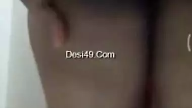 During video call amateur Desi girl with big XXX tits poses fully naked