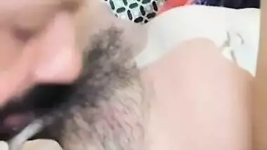 Desi charmer practices oral XXX sex with hairy pussy lover in MMS clip