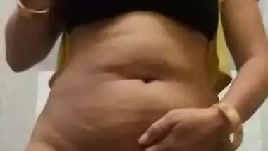 Undressing is a part of the job of the remarkable Desi XXX model