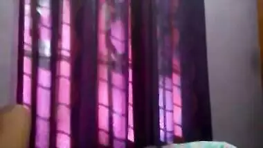 Tempting Indian woman sets camera to film XXX breasts during sex posing