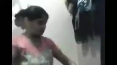 Bengali sex movie scene of a glamorous legal age teenager stripping for her lover on cam