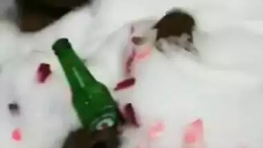 Attractive Desi chick enjoys beer and bubble bath in hot XXX video