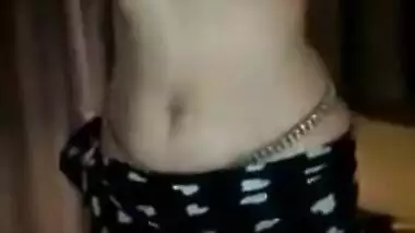 Sexy Indian teen girl is having a bath naked in the field