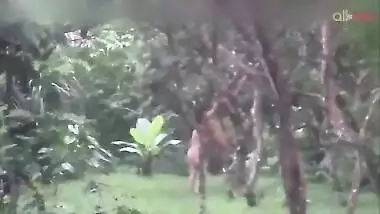 Two hot and sexy Desi aunty bathing in a outdoor under rain together