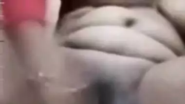 Young Desi guy jerks off watching fat bhabhi dildoing her XXX cunt