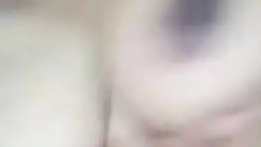 Indian XXX slut demonstrates her sex sized breasts and licks nipples