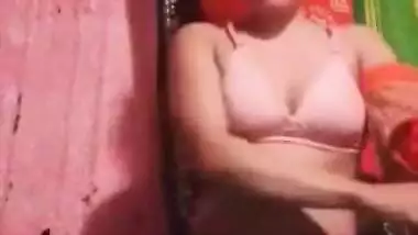 XXX feels obliged to take red top off and stay in front of camera nude