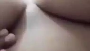 Awesome Desi chick plays with her sexy XXX breasts for the camera