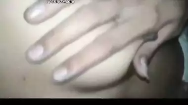 Desi girl pulls up her T-shirt and sex lover feels her XXX boobs