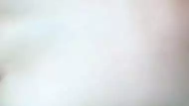 Lewd girl from India advertises her small boobies on camera in close-up