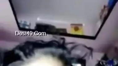Arousing Desi mom sits on floor and denudes snatch under the dress