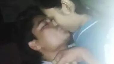 Sleeping Desi babe tries to cover face while sex partner kisses XXX lips