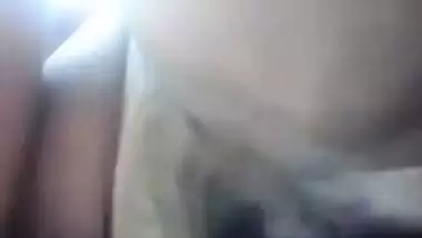 Big-tittied Desi hussy with huge breasts rubs her XXX pussy on cam