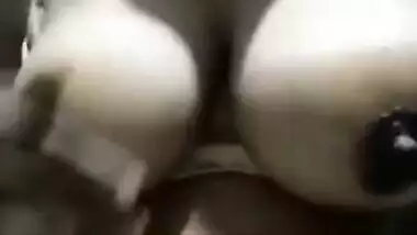 Mom with big knockers touches them and pinches nipples in sex video