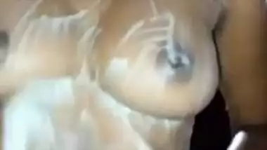 Desi girl touches her own XXX boobs taking a sex shower online