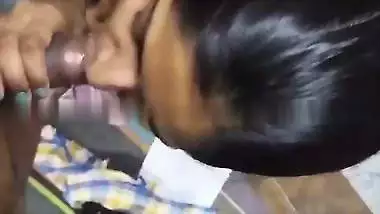 Cute girlfriend in bra giving blowjob to boyfriend