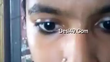 Indian teen with big eyes and pierced nostril shows what she has got