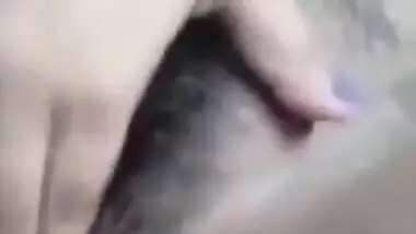 Desi Boudi with black hair does XXX porn of herself fingering her pussy