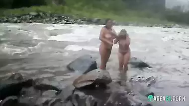 Voyeur sex clip two sexy desi aunty taking a bath outdoor by the river