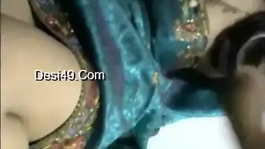 Solo Indian babe in a luxurious dress is excited so she touches tits