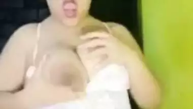 Desi whore with big XXX breasts turns men on during webcam show