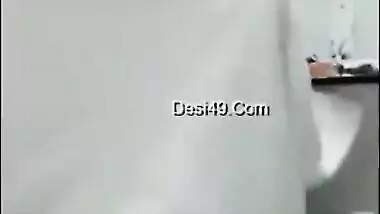 Pregnant aunty of Indian origin puts on clothes after taking a shower