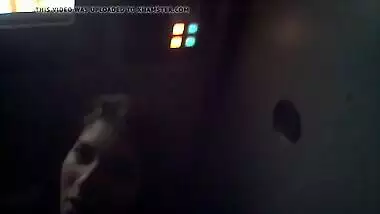 Gloryhole slut sucks cock in porn store video booth