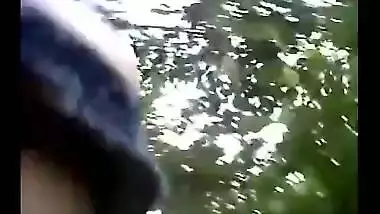Beautiful teen girl rides her boyfriend in an outdoor sex session