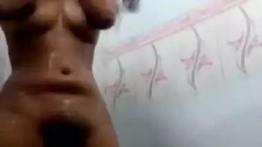 Girl takes a shower without knowing about camera filming porn video