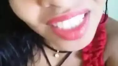 Desi chick in a red dress performs a sex show with XXX tits and vagina