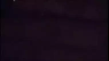 Young gal in red lingerie teases her XXX Desi pussy for the camera