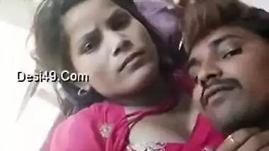 Young Desi woman is lying in bed with XXX lover kissing her on camera